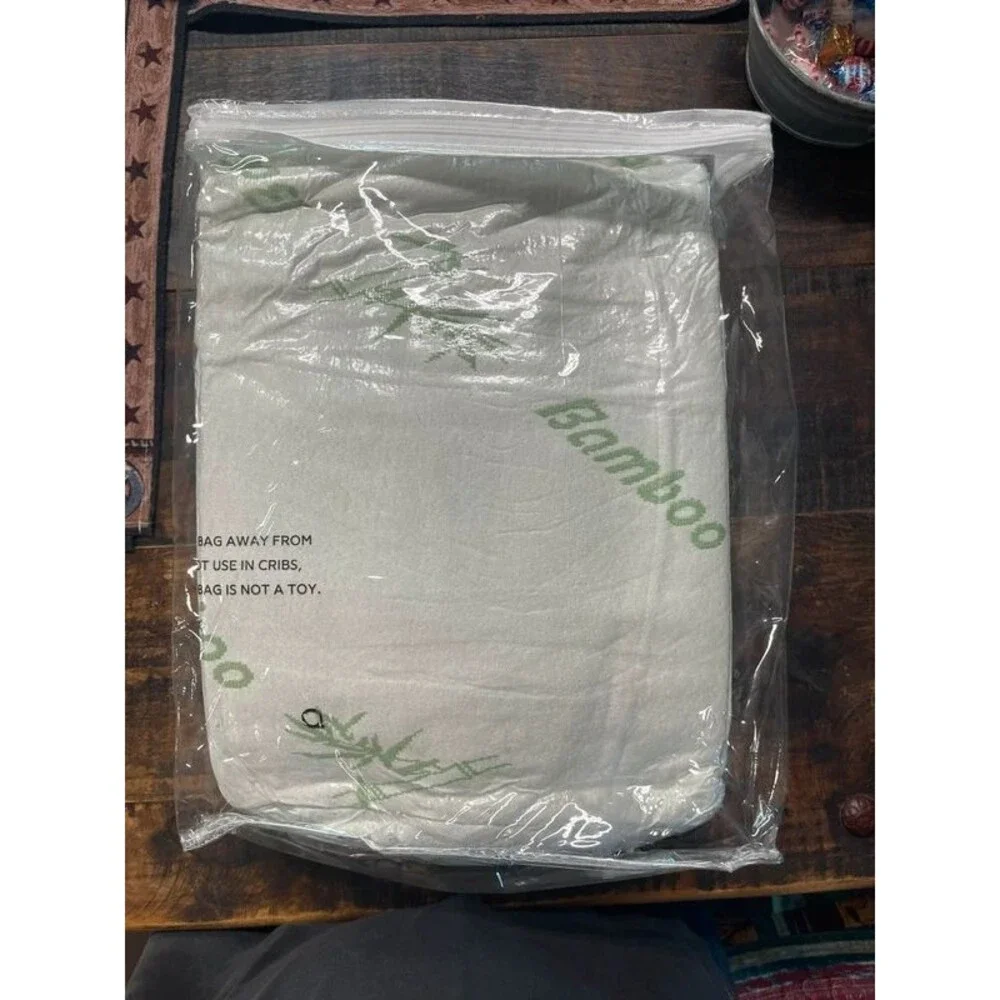 New in package Queen Size Niagara bamboo Mattress topper